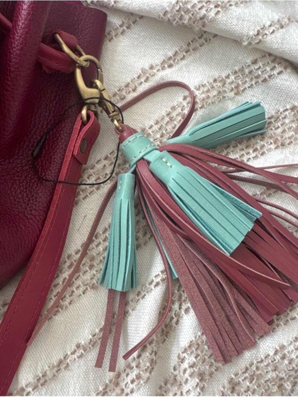 Portland Leather Berry Red Drawstring Bucket Bag with Tassels - charm included - Picture 7 of 8